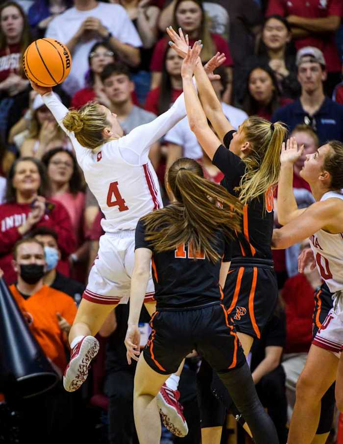 Nicole Cardaño-Hillary shoots over a pair of Princeton defenders.